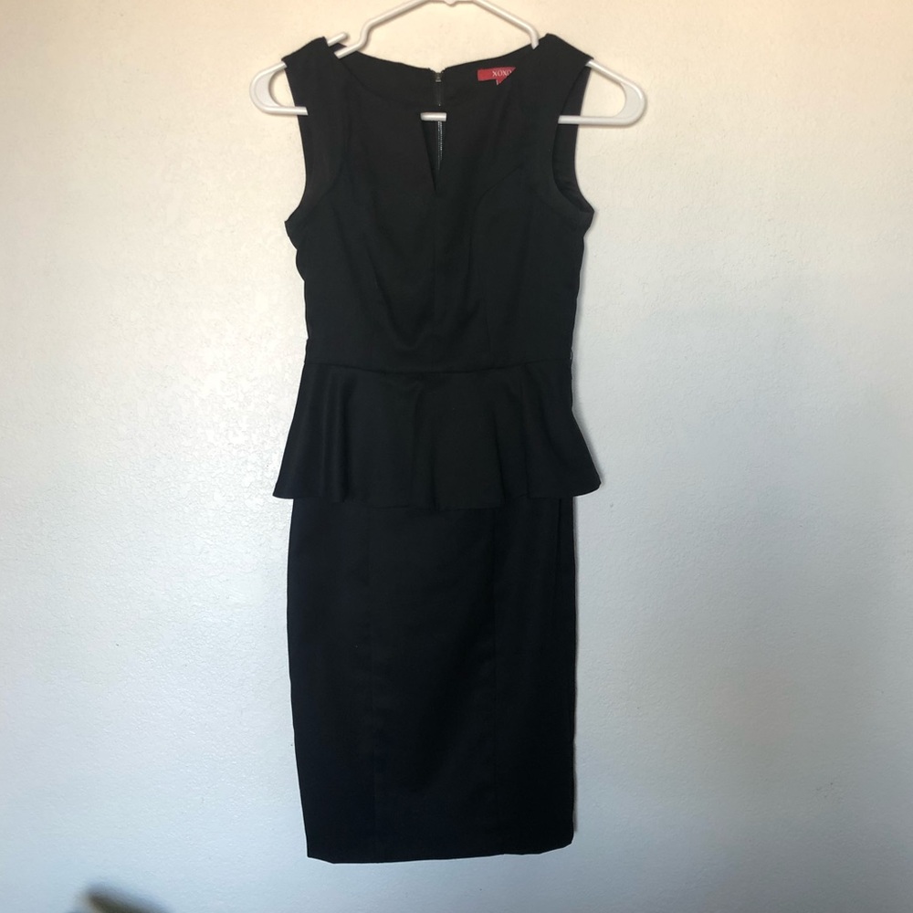 Black peplum dress with peekaboo, size 0